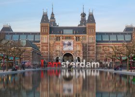 How To Visit the RIJKSMUSEUM in 2026: Tickets, Hours, and More Exterior of Rijksmuseum with I Amsterdam sign in front.