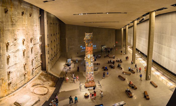 Interior of the 9/11 Memorial Museum with visitors.